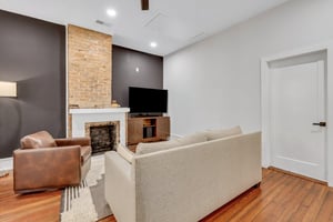Updated living room with all new furniture and wall mounted flat screen TV