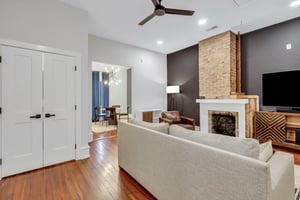 Updated living room with all new furniture and wall mounted flat screen TV