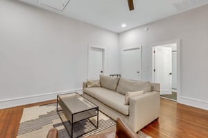 Updated living room with all new furniture and wall mounted flat screen TV