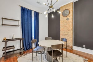 Cozy dining room adjacent to kitchen and living room