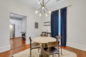 Cozy dining room adjacent to kitchen and living room