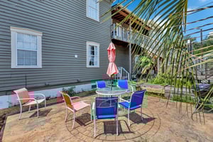 Shared patio area in rear of home
