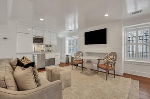 The garden level studio apartment features beautiful finishes and furnishings.