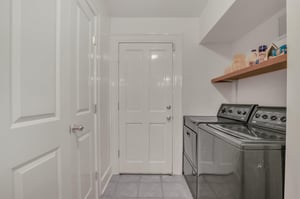 The laundry room on the first floor is conveniently located right off of the studio.