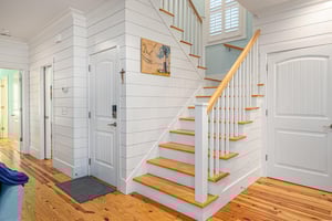 Heading upstairs, guests will find two additional guest bedrooms.