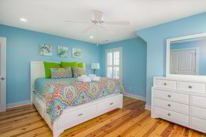 The second guest room features a King bed with an ample amount of storage.