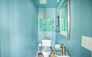 The half bath located on the first floor.
