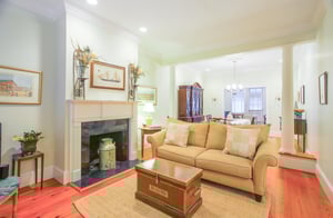 The tastefully decorated living room also features a flat screen television.