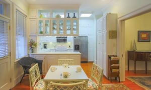 A breakfast nook is right behind the dining room, with a great view of the back patio.