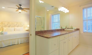 The ensuite bath has a large countertop, perfect for getting ready to go out.