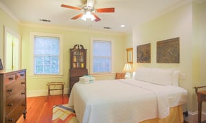 The second bedroom on the second floor has a queen bed and ensuite bath.