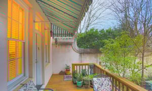 Behind the home you have a private deck and courtyard.