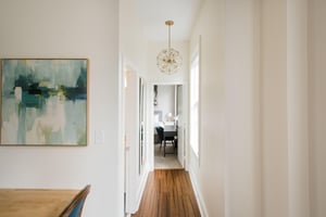 Down the hall, guests can find a fullbathroom and the guest bedroom.