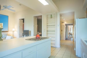 The butlers pantry is just off the kitchen.