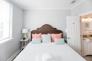 Just off of the primary, guests will appreciate having their own ensuite bathroom.