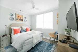 This bedroom offers a queensize bed.