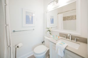 Just off of the second bedroom, you can find an ensuite bathroom.