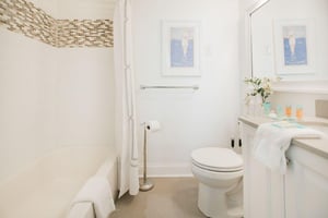 Fit with a soaking tub and shower combination.