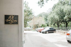 Your designated parking space is located behind the building.