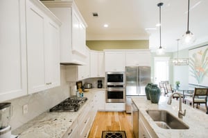 This kitchen is fully equipped from appliances to pantry items.