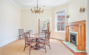 The homes original fireplaces are now decorative.