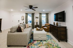 The main living space downstairs offers fine furnishings similar to upstairs.