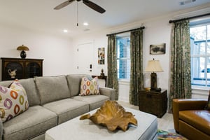 The sofa converts into a queensize sleeper, while the ottoman converts into a twinsize sleeper.