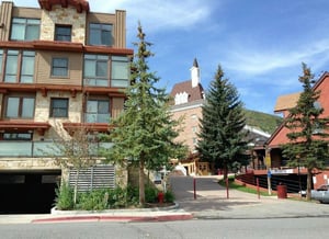Parking garage at The Lowell left, our building, Silver Mill House, center