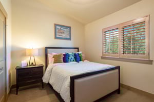 Cozy guest bedroom with Queen bed and down comforter.