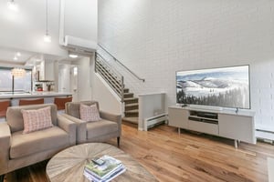 Bright, contemporary living room with gas fireplace