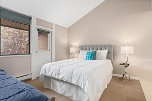 Cozy 2nd bedroom with queen and bunk twin over double bed