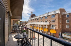 Sip your morning coffee on the private balcony at Lodge at Mountain Village 303 with views of the Park City Resort base — skiinskiout at its finest.