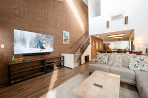 Big screen, soaring brick walls, and room to spread out — Park Avenue 216 is where your Park City condo rental dreams become reality.