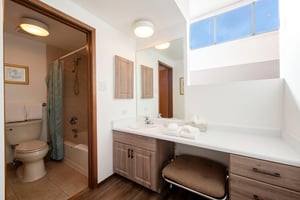 A bright, wellappointed bathroom with a vanity area to get ready in style — Park Avenue 216 thinks of everything.