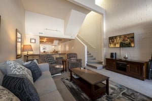 From the cozy sitting area to the open staircase and beyond, the characterful living space at Park Avenue 251 delivers the kind of thoughtful design that makes Park City condo rentals here truly memor