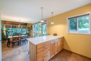 Cook, gather, and enjoy at Pay Day 183. This bright and spacious kitchen with a large island and dining area is everything you need in a Park City vacation rental — perfect for fueling up before hitti