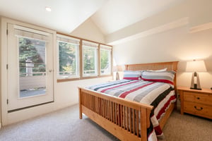 Step outside and breathe in the fresh mountain air from your own private deck This beautiful bedroom at Pay Day 189 offers the perfect blend of indoor comfort and outdoor living. Park City lodging th
