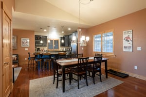 The open dining and kitchen area at Bear Hollow 4402 makes entertaining a breeze. With generous seating and a seamless flow between spaces, this Park City vacation rental is built for group getaways.