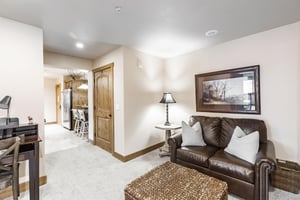 Jupiter Inn 18 is thoughtfully laid out with a cozy living area and easy flow between spaces, making it a practical and comfortable choice for Park City condo rentals.