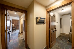 Step right in and feel at home — the charming entryway at Resort Plaza 5002 welcomes you to one of Park Citys most inviting vacation rentals, with rustic mountain details and a warm, cozy atmosphere