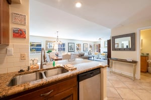 Stay connected with the group from the kitchen at Resort Plaza 5004 — this airy Park City condo rental features a seamless open layout, granite counters, and plenty of natural light for a relaxed and