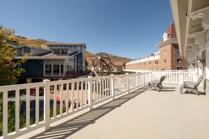 Step outside and soak in the stunning mountain surroundings from the expansive deck at Resort Plaza 5004 — this Park City vacation rental offers breathtaking views and fresh alpine air right outside y