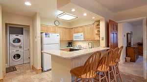 Whip up homecooked meals in the bright, fully equipped kitchen at Resort Plaza 5013 — a fantastic Park City vacation rental with a convenient breakfast bar for casual dining.