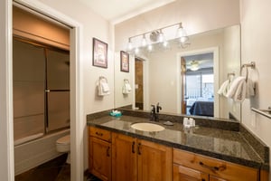 Freshen up in the wellappointed bathroom at Resort Plaza 5022 — a polished and comfortable detail that elevates this Park City condo rental above other Park City lodging options.