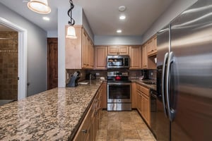 Cook up something delicious in this fully equipped kitchen, featuring granite countertops and stainless steel appliances. Everything you need for a comfortable Park City vacation rental experience