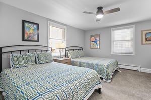 Bright, airy, and comfortably appointed, this double queen bedroom is flooded with natural light and fun décor, making it a great space for kids or guests. A top pick for Park City lodging for the who