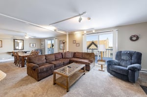 This bright and spacious living room offers plenty of room to spread out, with easy access to the outdoor balcony. Everything you need for a comfortable and memorable Park City lodging experience.