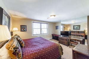 Classic mountain charm meets everyday comfort in this inviting primary bedroom, complete with rustic furnishings and plenty of room to unwind. Resort Plaza 5030 is the ideal Park City lodging choice f