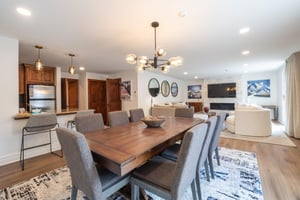 Warm wood tones, contemporary lighting, and an open connection to the living spaces make this dining area a true highlight of Resort Plaza 5031. A refined and welcoming space for Park City lodging at