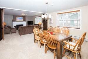 Natural light, classic wood furnishings, and an open connection to the living area make this dining space a comfortable and inviting spot for shared meals. Resort Plaza 5040 is a great choice for Park